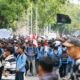 Ratusan mahasiswa dari berbagai universitas di Riau gelar aksi damai di Jalan Jenderal Sudirman, Pekanbaru, menuntut pembebasan rekan mereka dan pengesahan RUU Perampasan Aset