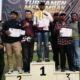 Peserta Turnamen Menembak PERBAKIN Bengkalis mengikuti pertandingan senapan angin dalam rangka HUT ke-81 Republik Indonesia.